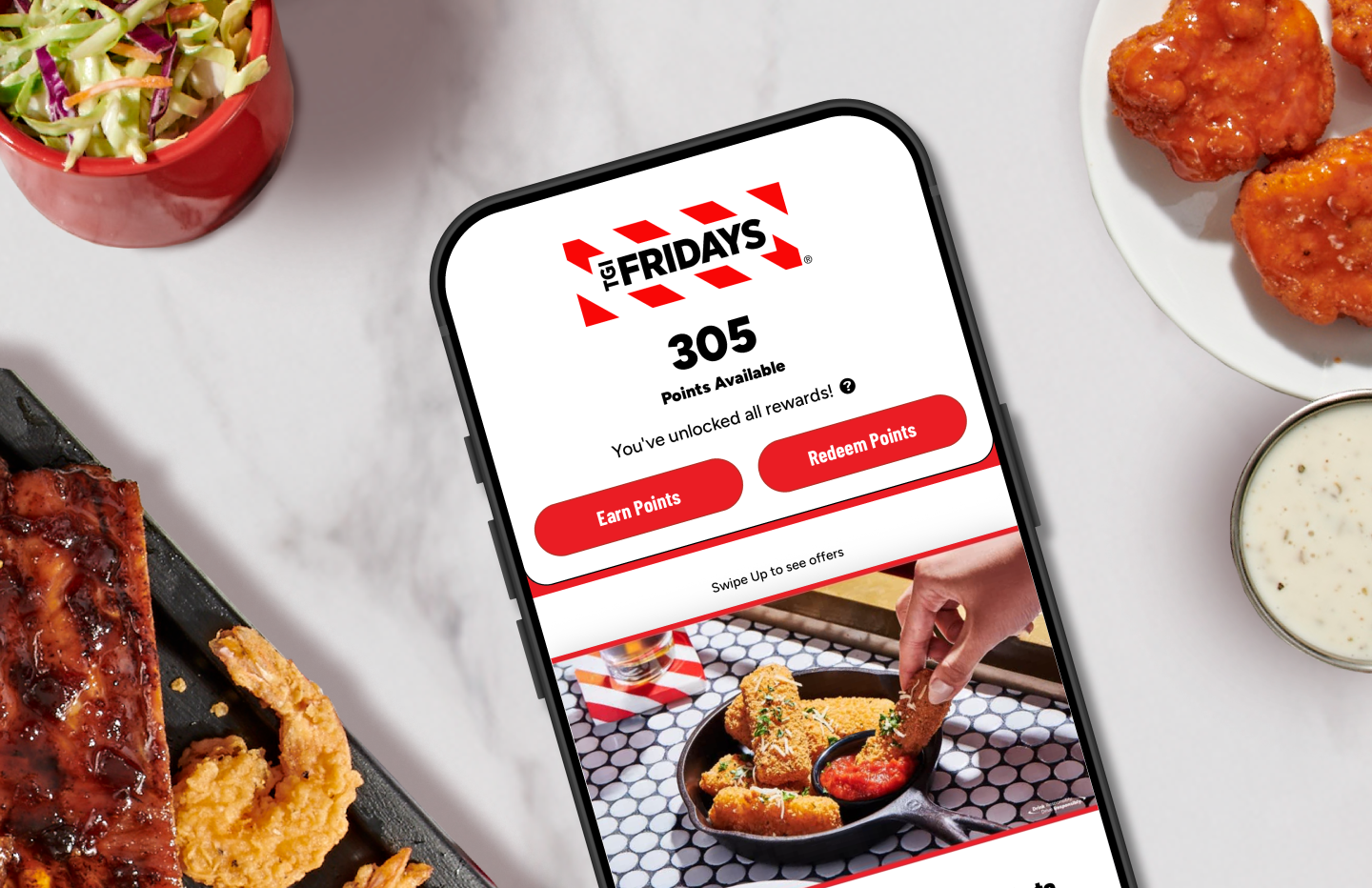 TGI Fridays app rewards screen showing points balance and options to earn and redeem rewards
