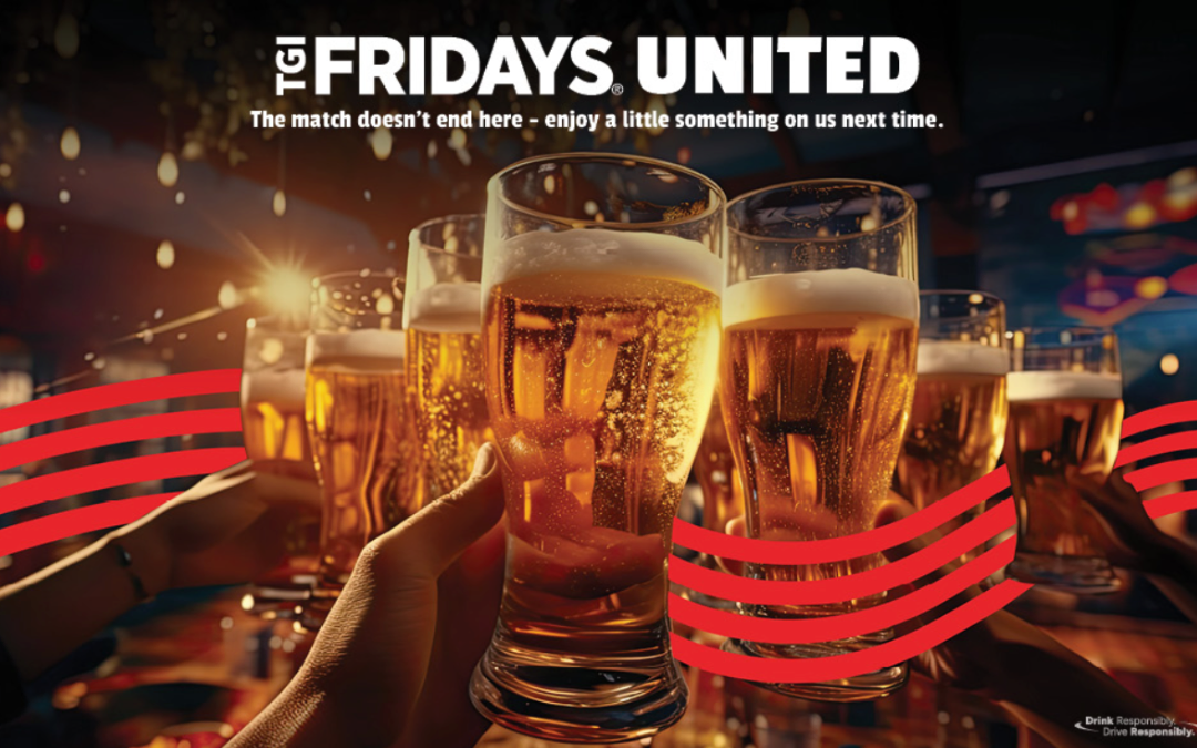 Group of friends raising beers during a Fridays United football watch party at TGI Fridays.